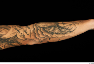 Claudio forearm nude tattoo 0004.jpg